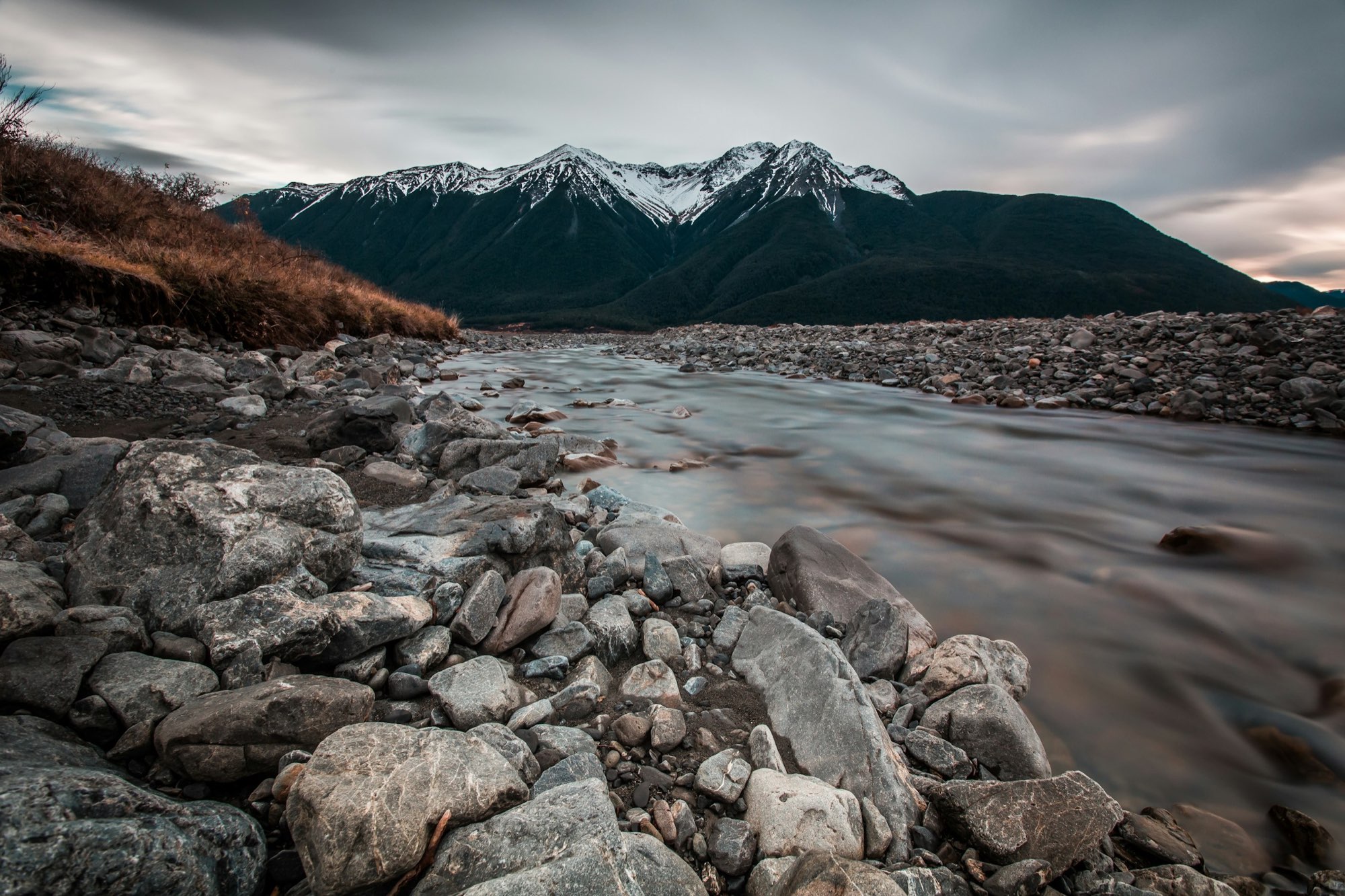 Te Wai Pounamu river and mountains, West Coast New Zealand